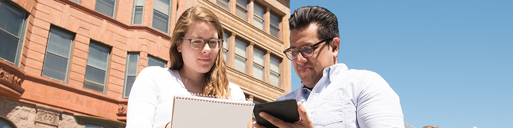Faculty member assisting a student.
